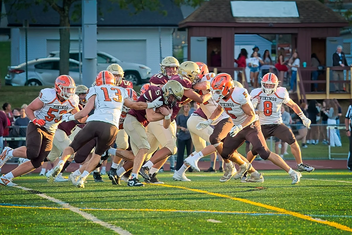 Defense stopping the RB